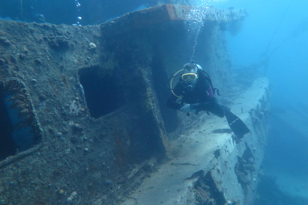 A photo of a solo diver with the el minya wreck taking the divemaster course with chloes diving center in hurghada