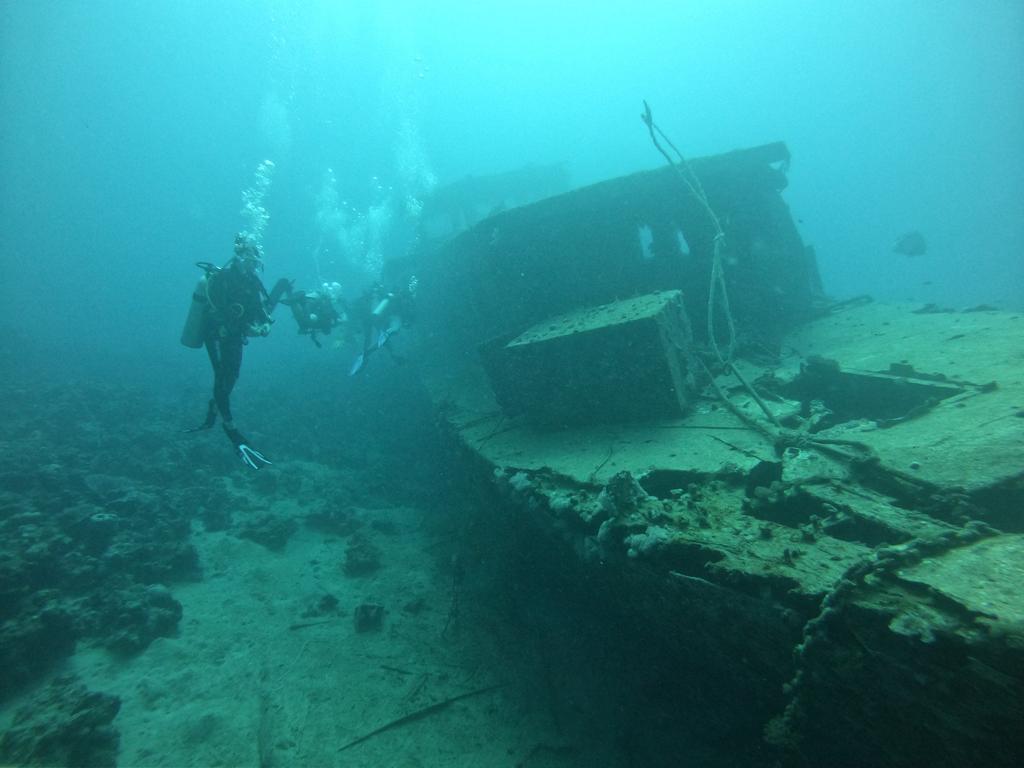 A photo from a group of divers in chloes diving center with the wreck in the advanced open water course