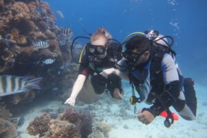 A Photo of a first time diver discovering scuba diving with an introductory dive with chloes diving center in hurghada